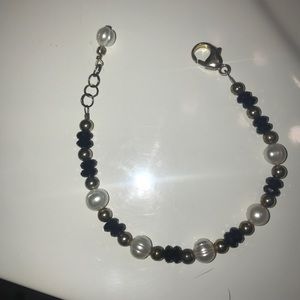 pearl/ black & gold bracelet